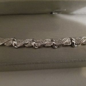 1 ct. diamond swirl line bracelet from zales.